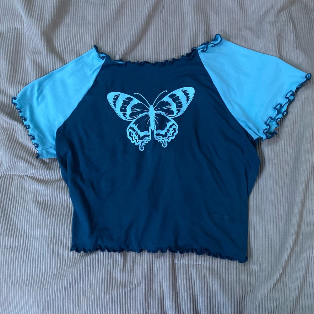 Blue open back butterfly top
